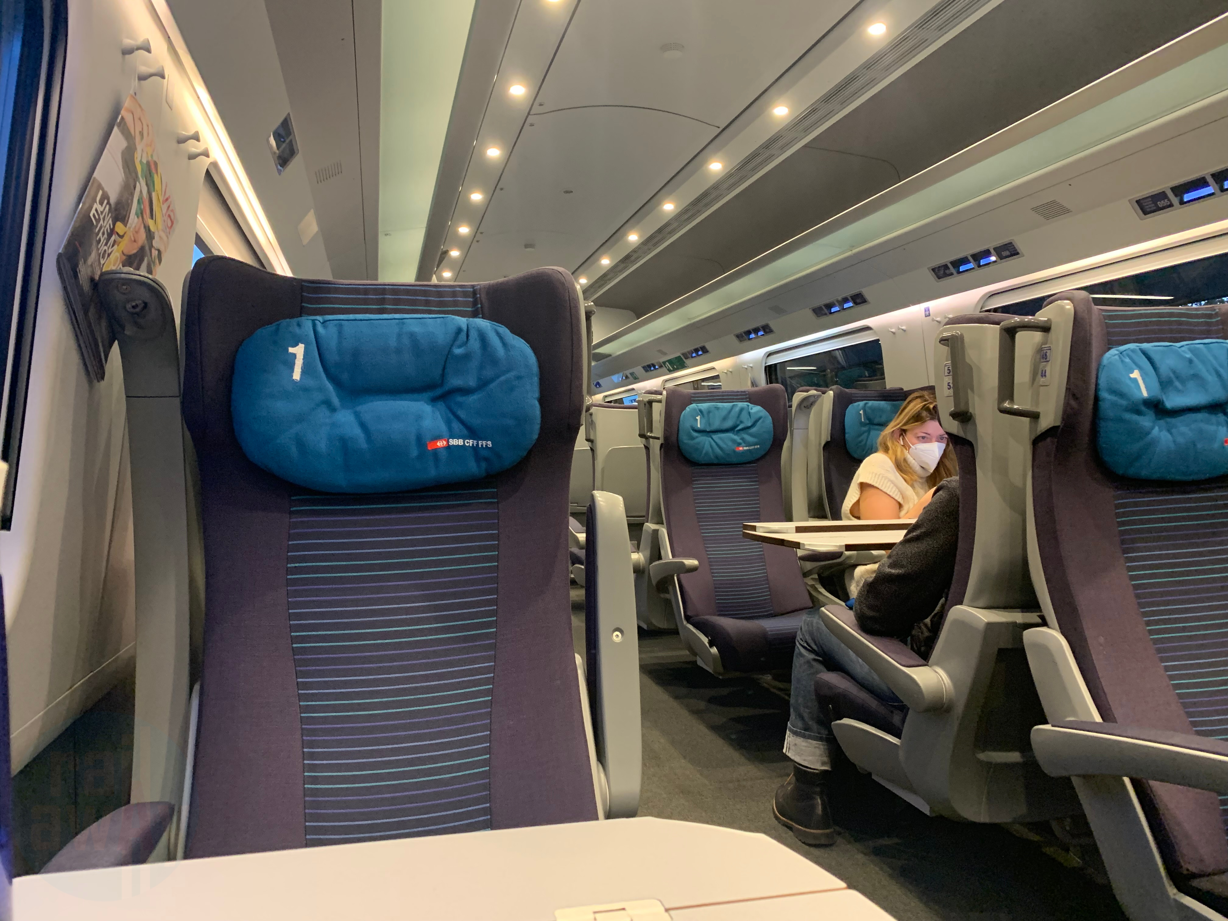 Blue and purple seats and grey carpet