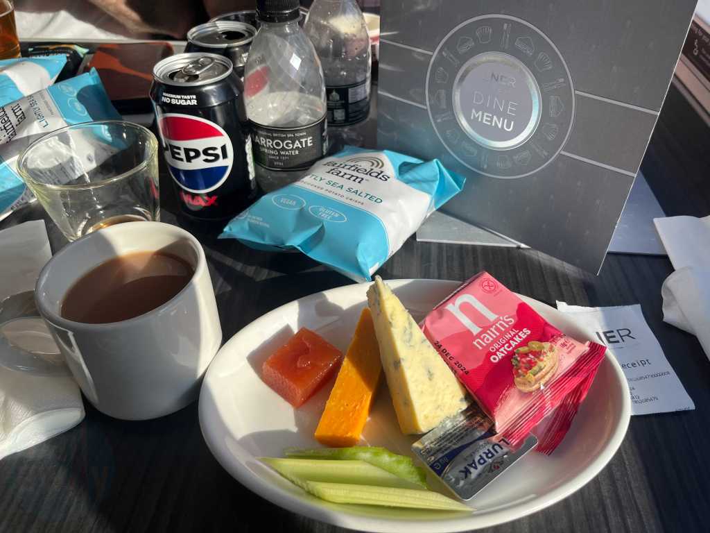The cheese plate and a cup of tea on the LNER Azuma train in First Class